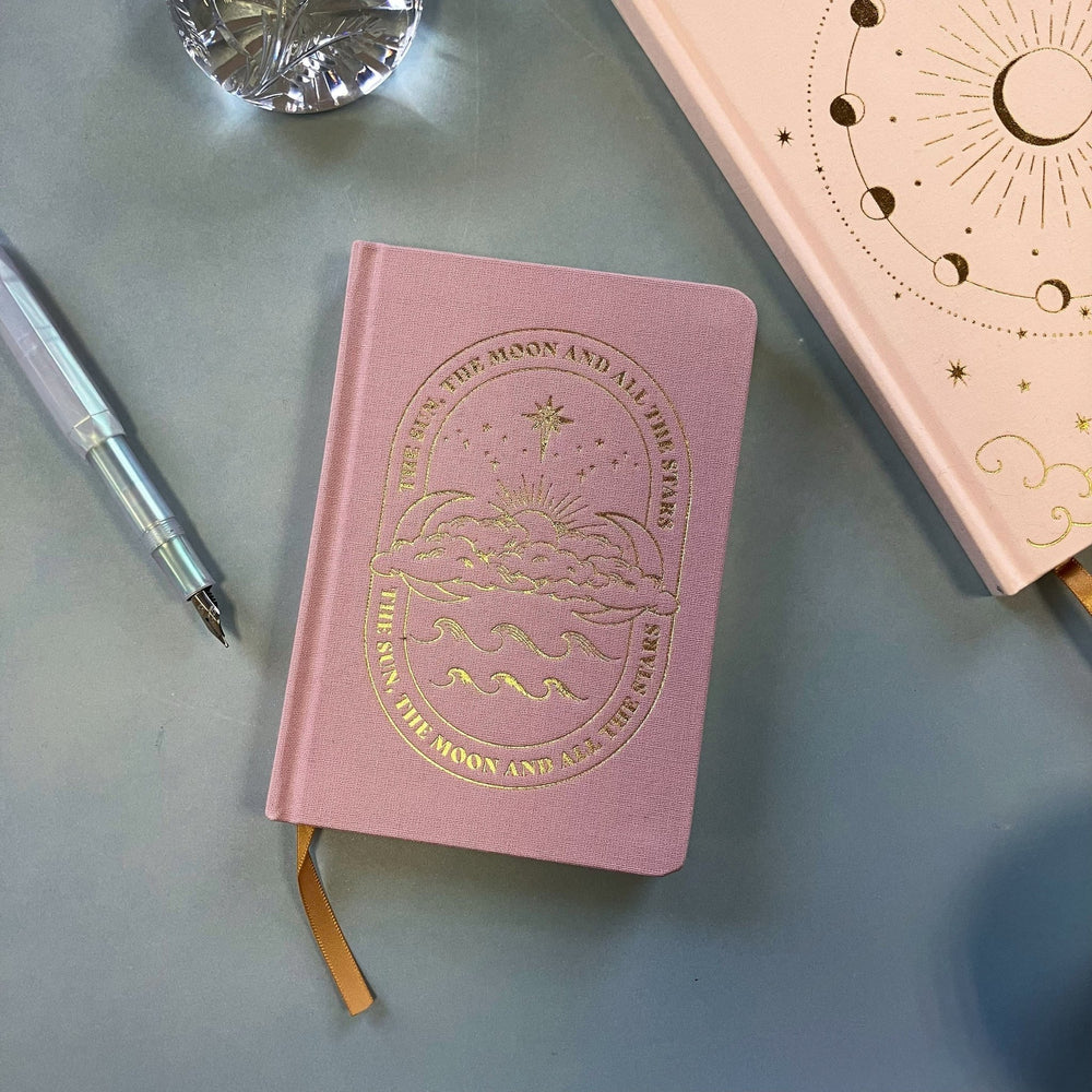 
                  
                    Pink Sun and Moon Notebook - The Willoughby Book Clubnotebook
                  
                