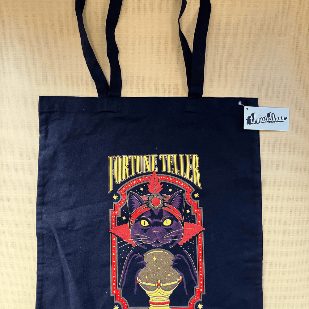 
                  
                    Tote Bag 'Fortune Teller' by Thiago Correa - The Willoughby Book ClubHandbags, Wallets & Cases
                  
                