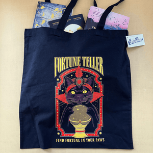 
                  
                    Tote Bag 'Fortune Teller' by Thiago Correa - The Willoughby Book ClubHandbags, Wallets & Cases
                  
                